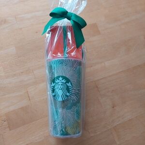 Starbucks 16 Fl Oz (473 ml) Coldbrew Travel Tumbler with Pink and Green Accents.